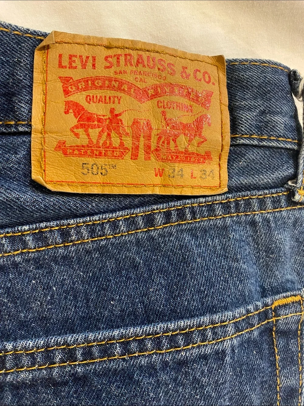 Levi's Men's 2018 Dark Blue 505 Straight Jeans with Leather